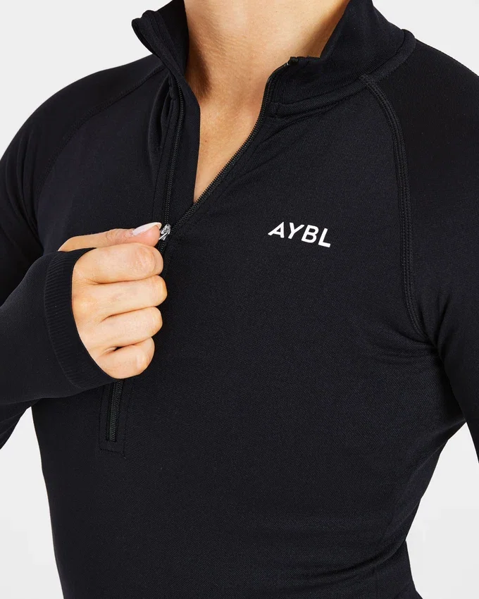 Essential naadloze pullover met halve rits