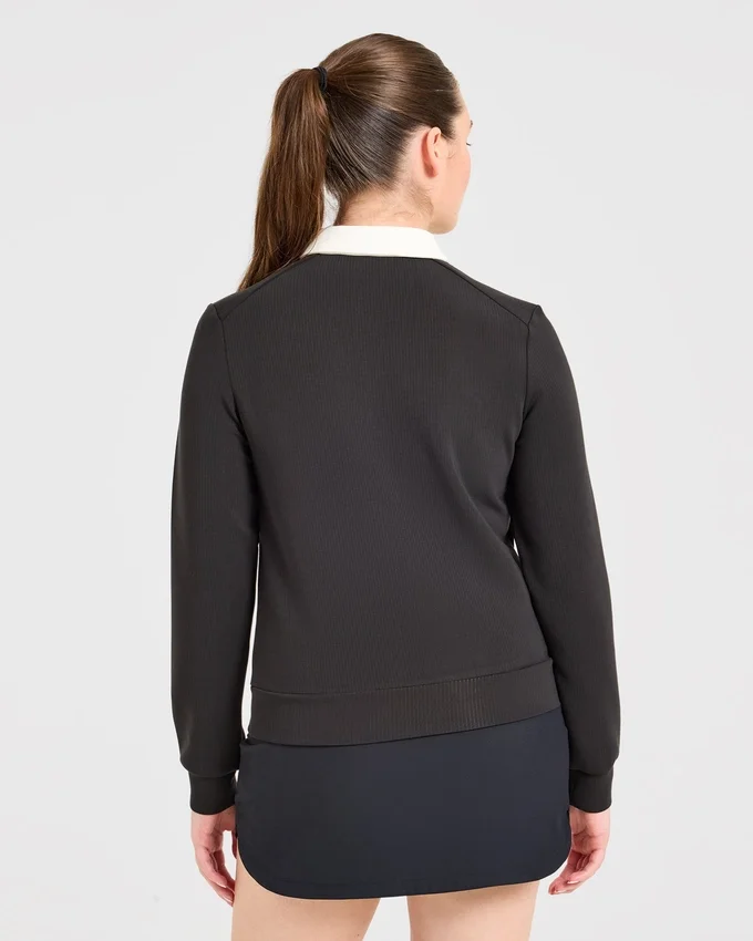 Kenmerkende polo met lange mouwen