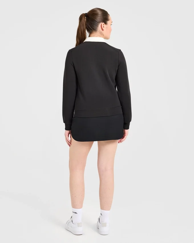 Kenmerkende polo met lange mouwen