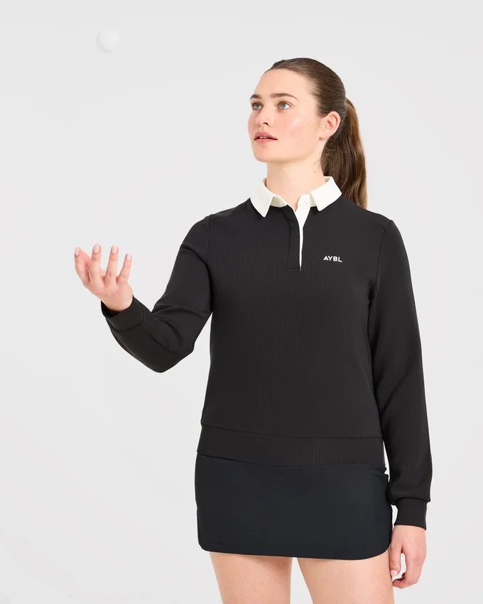 Kenmerkende polo met lange mouwen