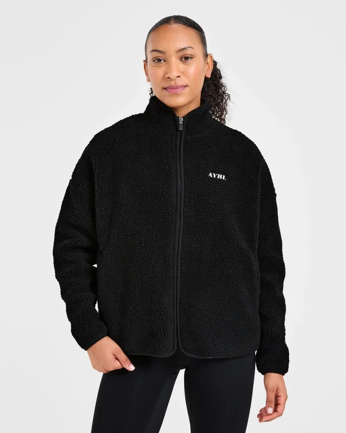 Oversized fleecejas met rits