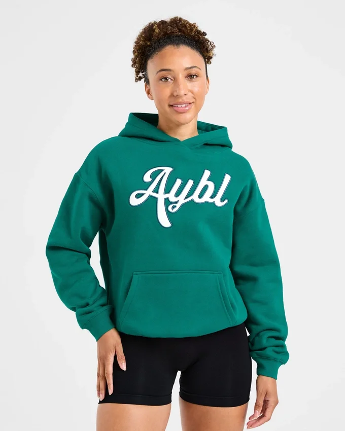 Oversized hoodie met geborduurd opschrift