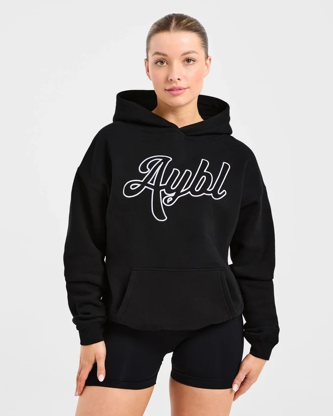 Oversized hoodie met geborduurd opschrift