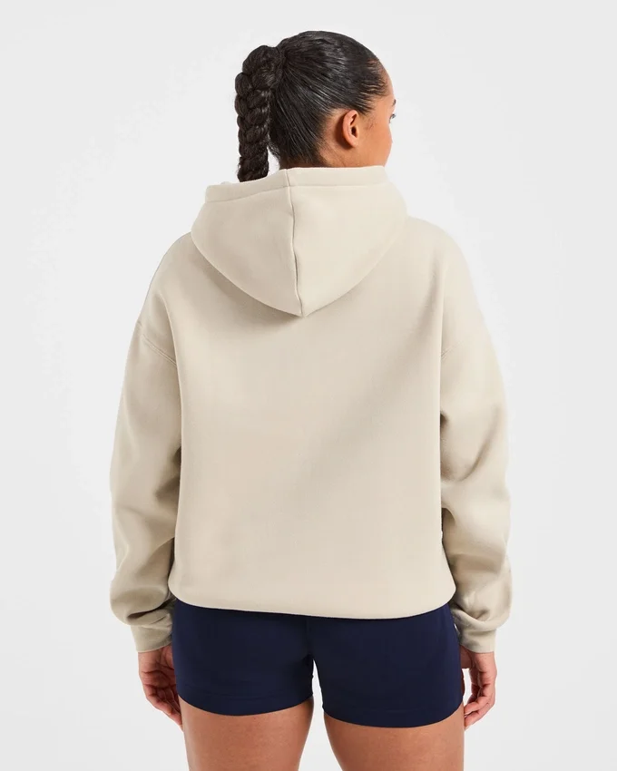 Oversized hoodie met geborduurd opschrift