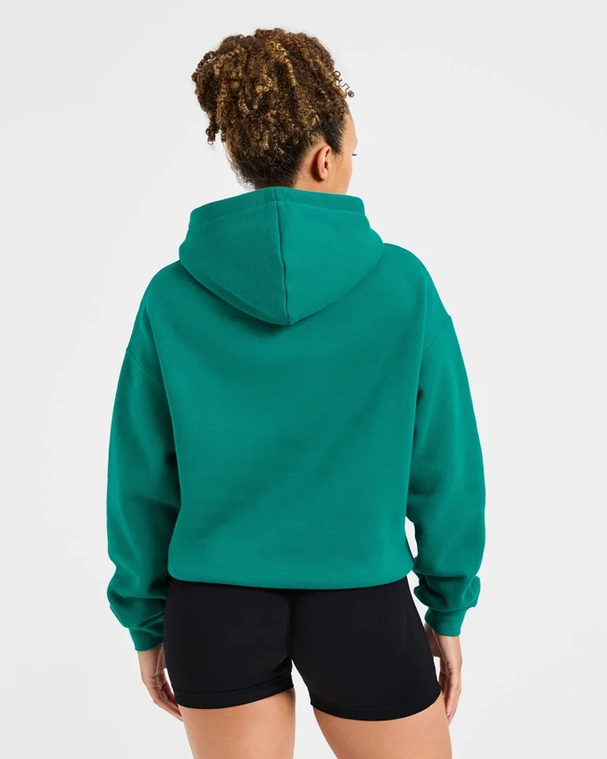 Oversized hoodie met geborduurd opschrift
