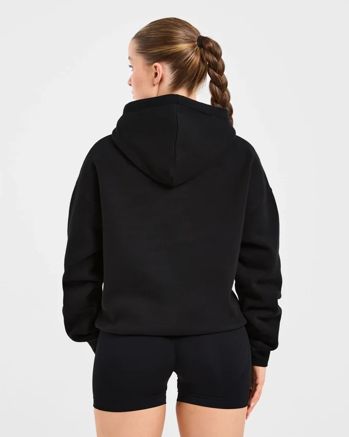 Oversized hoodie met geborduurd opschrift