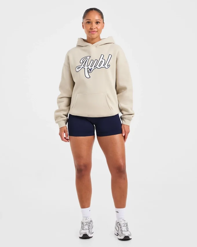 Oversized hoodie met geborduurd opschrift