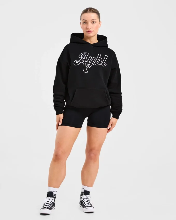 Oversized hoodie met geborduurd opschrift