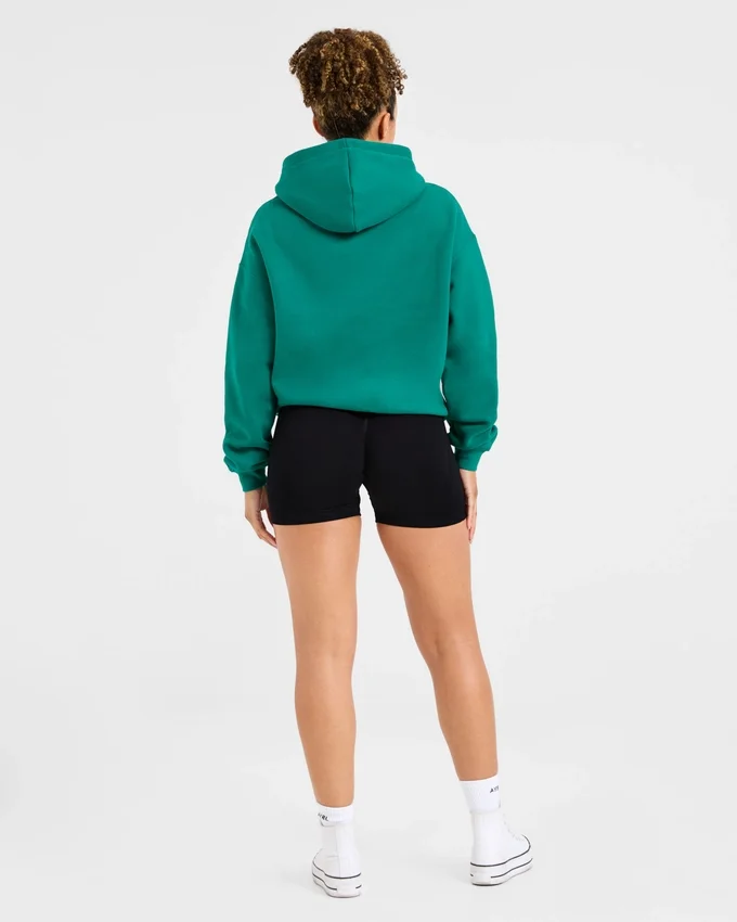 Oversized hoodie met geborduurd opschrift