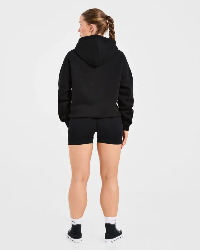 Oversized hoodie met geborduurd opschrift