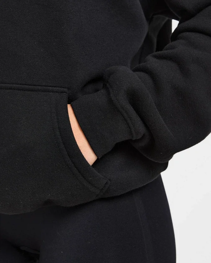 Oversized hoodie met geborduurd opschrift