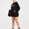 Oversized hoodie met geborduurd opschrift