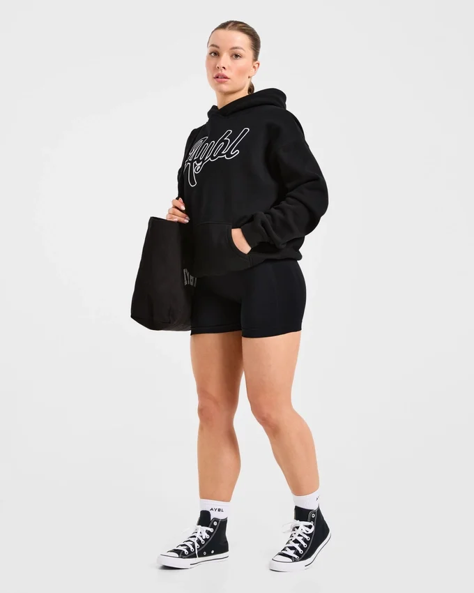 Oversized hoodie met geborduurd opschrift