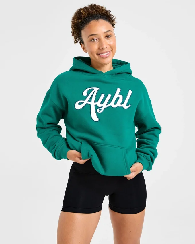 Oversized hoodie met geborduurd opschrift
