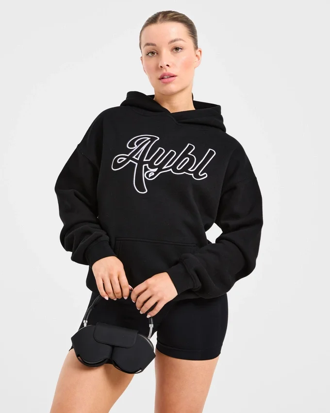 Oversized hoodie met geborduurd opschrift