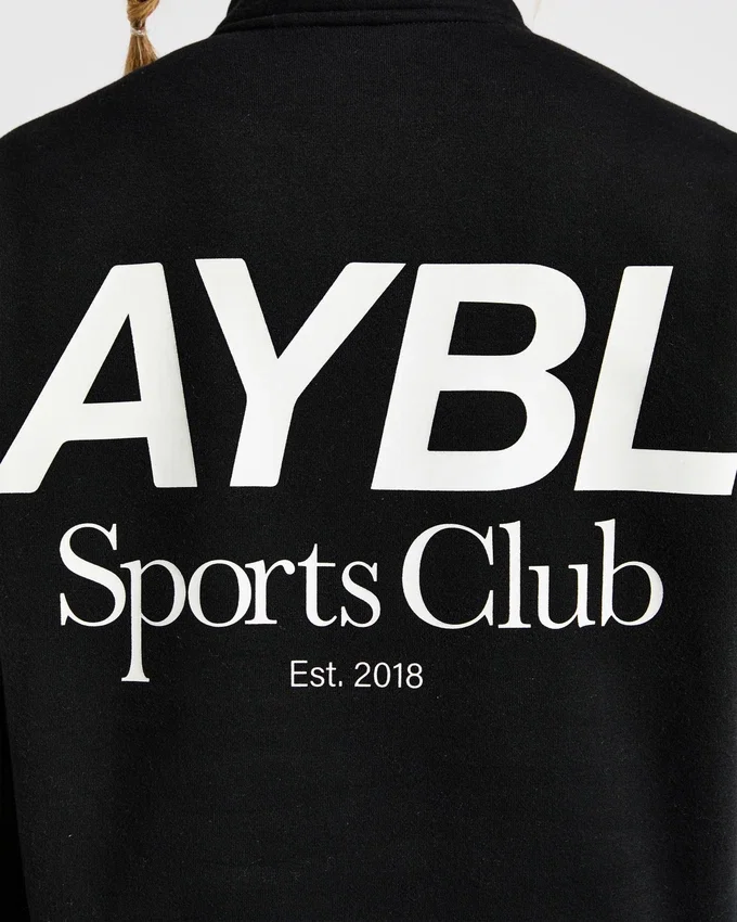 Sports Club oversized pullover met 1/4 rits