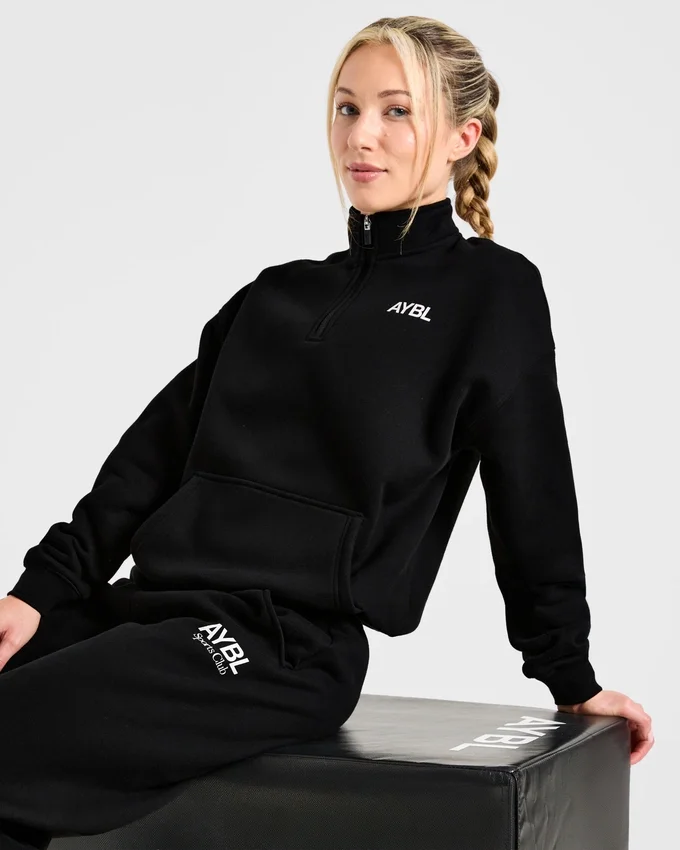 Sports Club oversized pullover met 1/4 rits