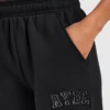 Varsity-joggingbroek met opgestikt logo, oversized pasvorm en rechte pijpen