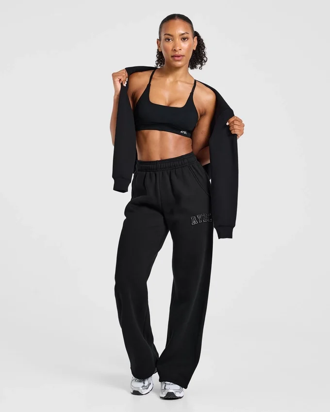Varsity-joggingbroek met opgestikt logo, oversized pasvorm en rechte pijpen