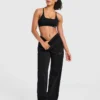 Varsity-joggingbroek met opgestikt logo, oversized pasvorm en rechte pijpen