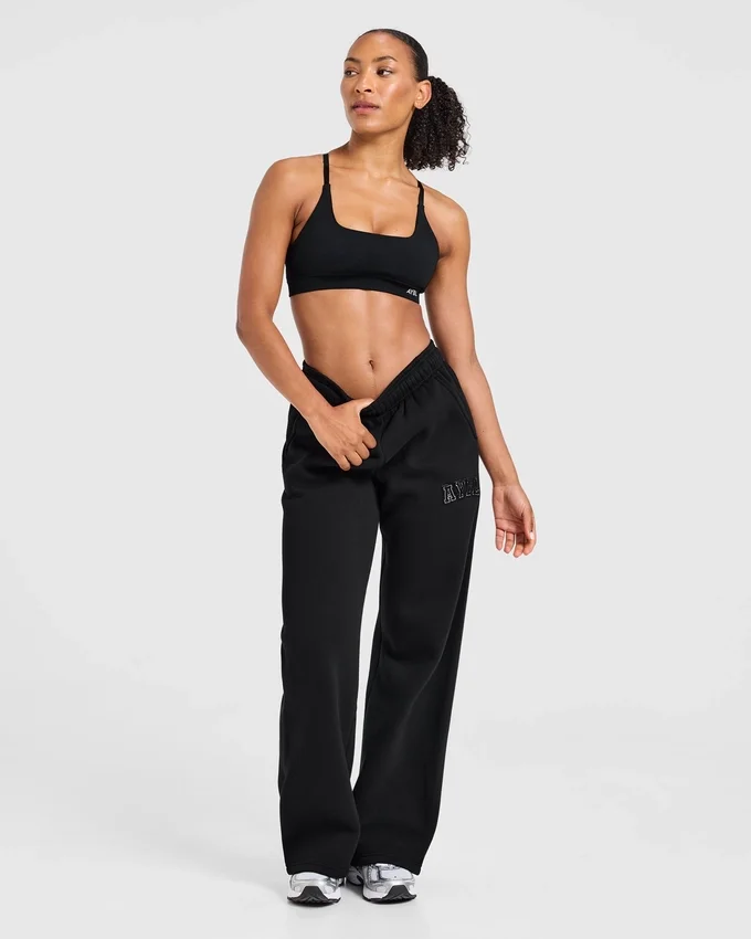 Varsity-joggingbroek met opgestikt logo, oversized pasvorm en rechte pijpen